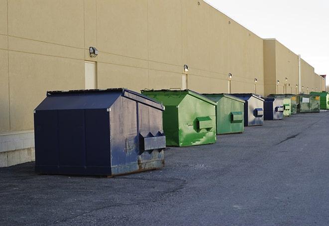 multiple construction dumpsters at a worksite holding various types of debris in Duvall, WA